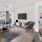 a living room with a large glass door