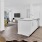 a kitchen with white cabinets